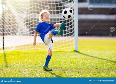 Kids Play Football Child At Soccer Field Stock Photo Image Of Keeper