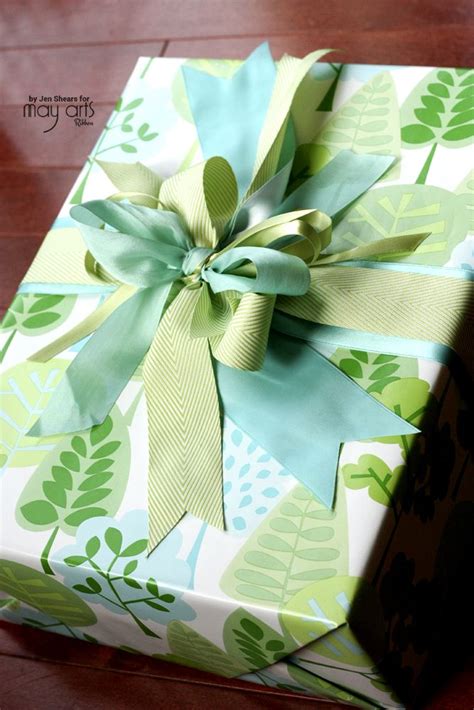 You can make these bags out of any paper, including tissue paper, which a really creative alternative for ribbons is a bundle of uninflated balloons! Gift Wrapping: Layering Ribbons - Ribbon Resource Online ...