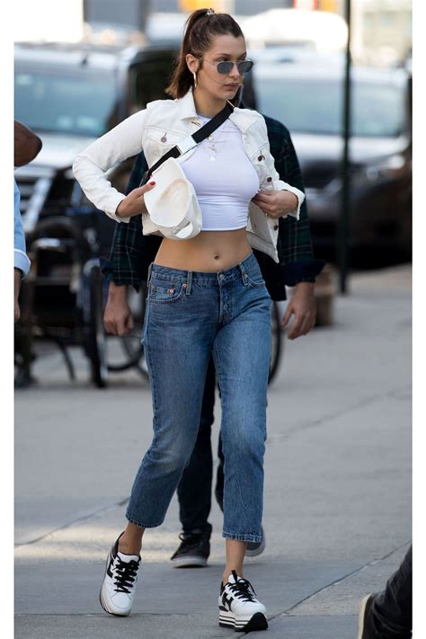 Bella Hadid Looks Chic In A White Jacket And Matching Crop Top While