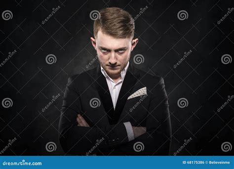 Elegant Young Man In Suit Looking Frowning Stock Photo Image Of