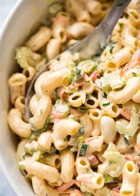We've got kalamata olives, tomatoes, cucumber, and feta cheese, all tossed with pasta and a lemony dressing. Macaroni Salad | RecipeTin Eats