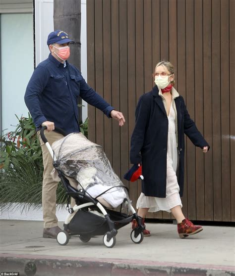 Hunter Biden Carries Nine Month Old Son Beau On His Hip In LA Daily