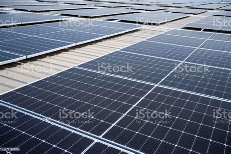 Photovoltaic Panels Which Installed On The Rooftop Of The Building