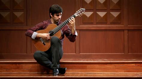 Classical Guitar Player Using Fingerstyle Technique Fingerstyle