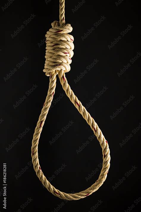 Brown Rope Noose Dark And Light On Black Background Concept Of Hanging