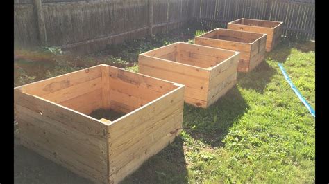 How To Make A Raised Garden Bed With Pallet Wood Diy Daddy Raised Garden Beds Garden Beds