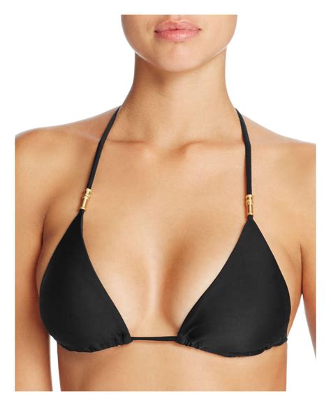 See actions taken by the people who manage and post content. Lyst - Vix Lucy Bikini Top in Black