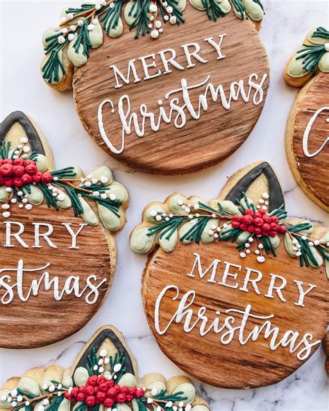 Decorated Cookies With Merry Christmas Lettering On Them
