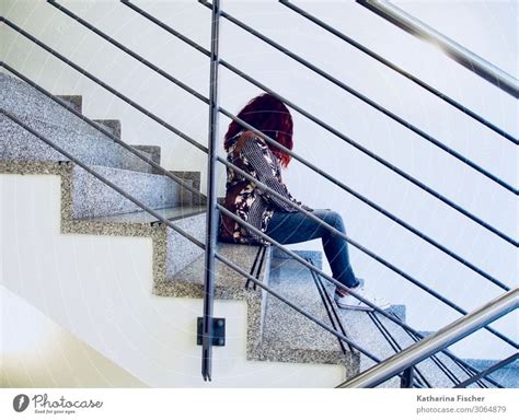 Woman Sitting In The Staircase A Royalty Free Stock Photo From Photocase