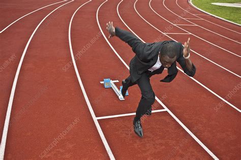 Businessman Sprinting On Running Track Stock Image F0035704