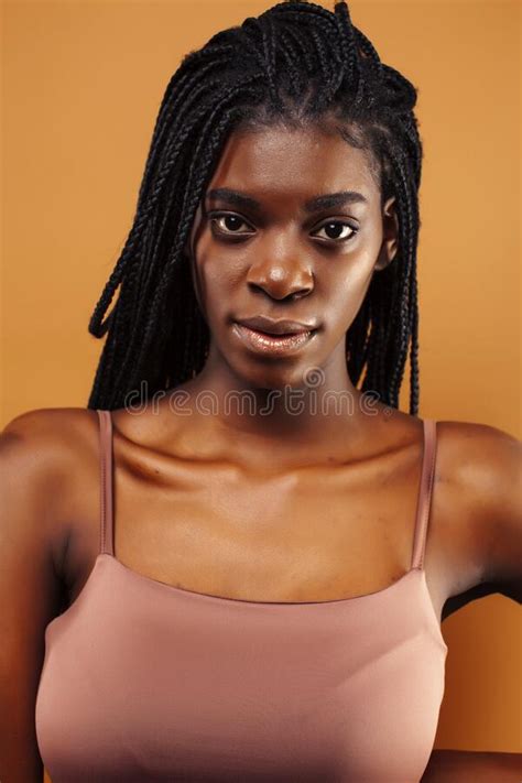 Pretty Young African American Woman With Braids Posing Cheerful
