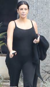 Pregnant Kim Kardashian Shows Off Baby Bump In Catsuit