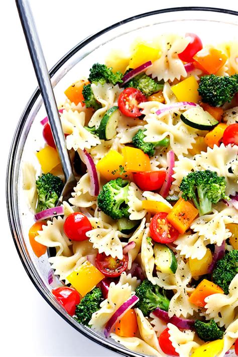 Add the dressing, including the onions, to the pasta and toss until evenly combined. Veggie Lovers' Pasta Salad | Gimme Some Oven