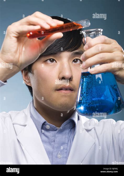 Scientist Holding Test Tubes Stock Photo Alamy