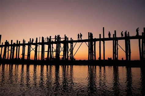 Pier Silhouette Photograph Of Two Person Standing On Wooden Bridge