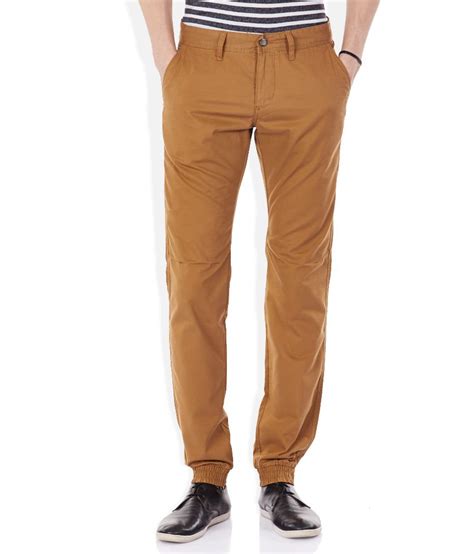 Celio Brown Solid Flat Front Trousers Buy Celio Brown Solid Flat