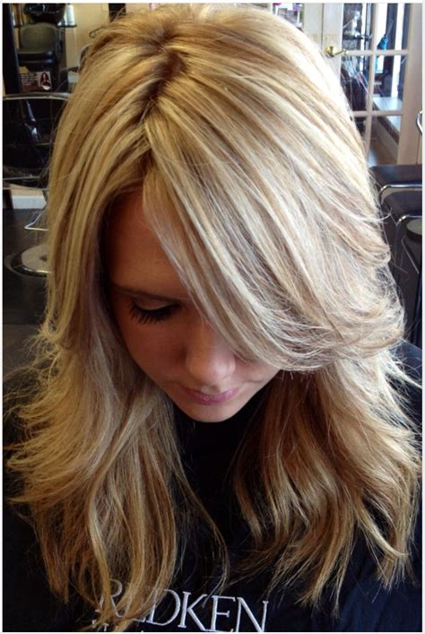 Growing out gray hair with highlights. A TON of highlights, with paper thin lowlights that blend ...