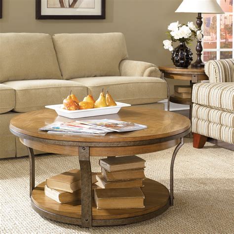 The two ends pull apart to reveal a storage compartment inside. Have to have it. Hammary Vero 2-Piece Coffee Table Set ...