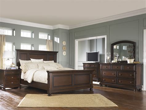 Millennium By Ashley Porter Four Piece Rustic Brown King Bedroom Set