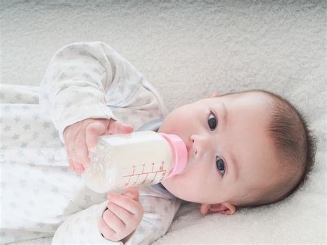 Baby Boy Drinking Milk From The Bottle At Home Hardy Pediatric