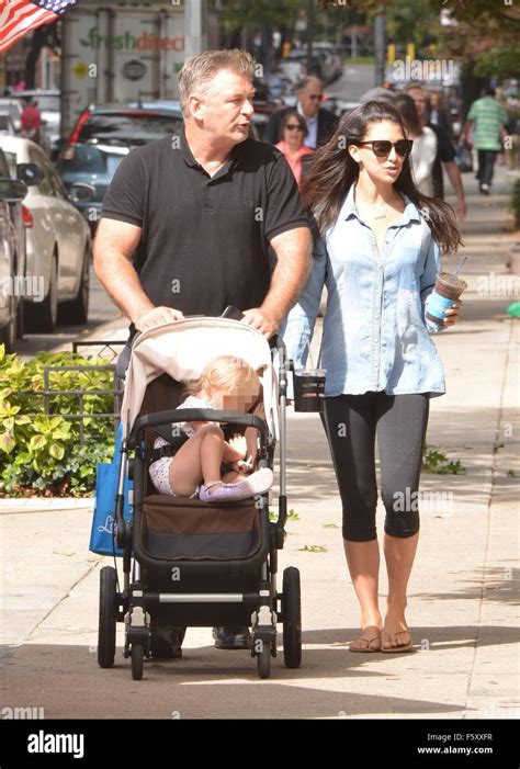 Alec Baldwin And Wife Hilaria Baldwin Take Their Daughter Carmen Out For A Stroll In Soho