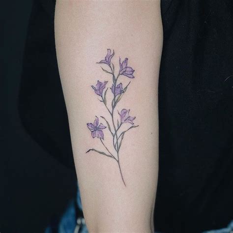 These Birth Flower Tattoos Will Make You Forget About Your Zodiac Sign Larkspur Tattoo Birth