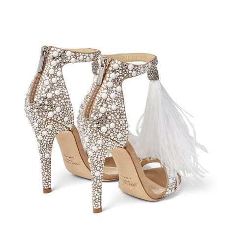 white suede and hot fix crystal embellished sandals with an ostrich feather tassel viola 110
