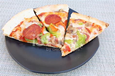 Three Slices Of Thin Crust Pizza Stock Photos FreeImages Com