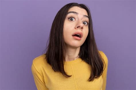 Free Photo Impressed Young Pretty Caucasian Girl Isolated On Purple Wall