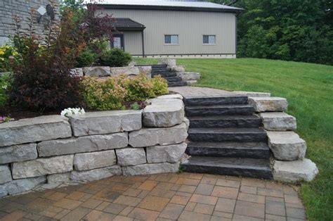 Armour Stone Retaining Wall With Natural Stone Steps