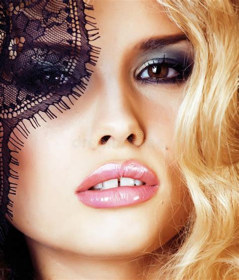 Portrait Of Beauty Blond Young Woman Through Black Lace Close Up Stock