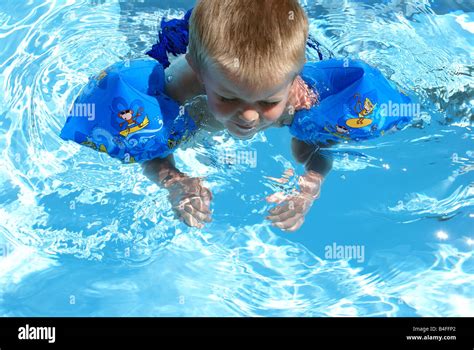 Child Learning To Swim Stock Photo Alamy