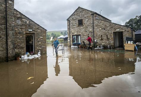north yorkshire flooding pub landlady nearly drowns and bridges collapses as flash floods hit