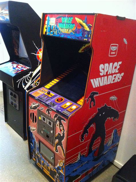 The Original Space Invaders And Asteroids In The Background Arcade