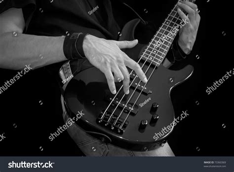 Musician Playing Electrical Bass Guitar Black And White