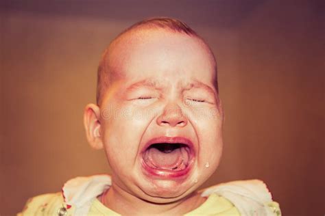 Portrait Of A Crying Baby Tears On The Face Stock Image Image Of