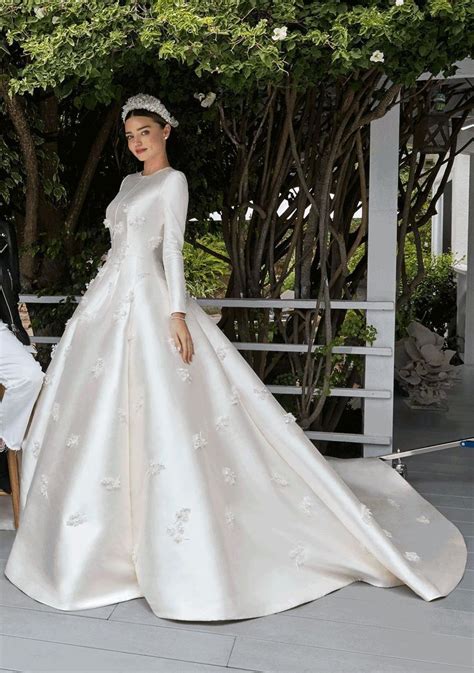 Gorgeous photos of the wedding dress supermodel miranda kerr wore when she married billionaire evan spiegel. Miranda Kerr ties the knot in custom Christian Dior. # ...