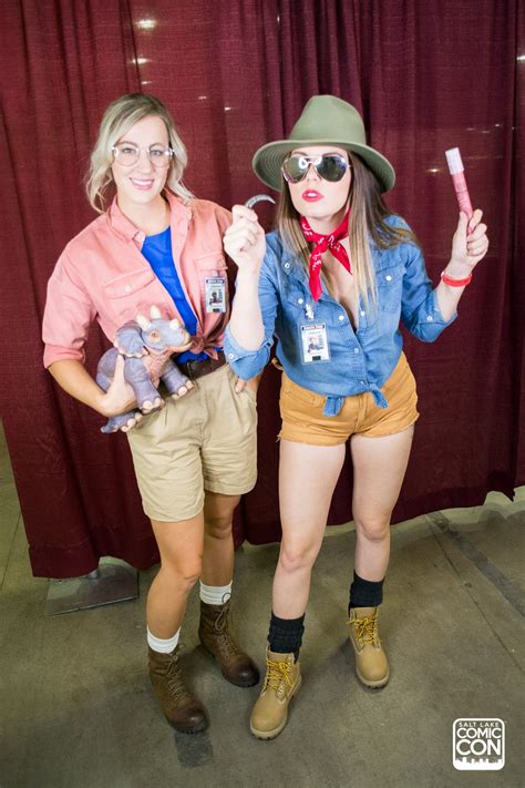 Two Women Dressed Up In Costume Posing For The Camera