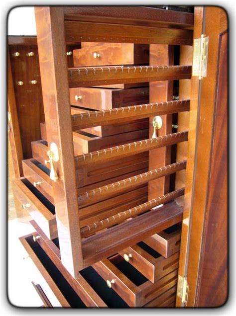 Very unique craft armoire with fold out table: Fivebraids Custom Woodworking - Jewelry Armoire in 2020 ...