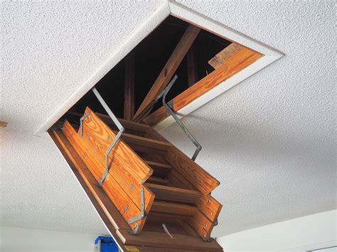 Garage Retractable Stairs Things To Consider Before Buying An Attic