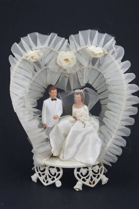 A gold wedding cake will give your wedding a glam touch. Vintage 50s 60s Cake Topper Wedding or Anniversary by ...