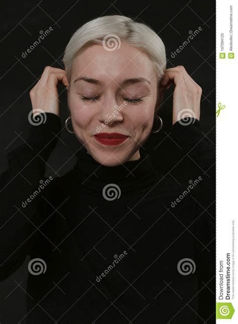 Beautiful Emotional Girl With White Hair On A Black Background Stock
