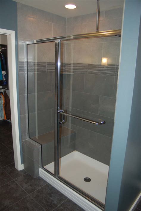 Retiling a shower consists of completely knocking out the existing tile and installing new tile. Wonderful shower tile and beautiful lavs! | Rose ...