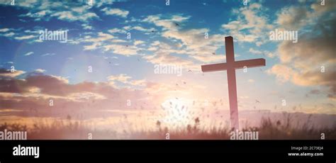 Silhouette Jesus Christ Crucifix On Cross On Calvary Sunset Background