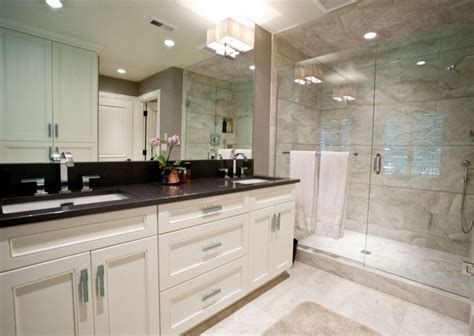 Choose from a wide variety of vanities in vintage and contemporary designs. Black granite top over white bathroom vanity | Black ...