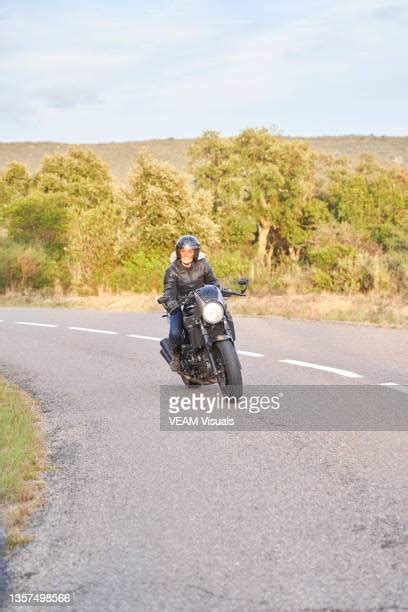 Old Lady Driving Motorcycle Photos And Premium High Res Pictures Getty Images