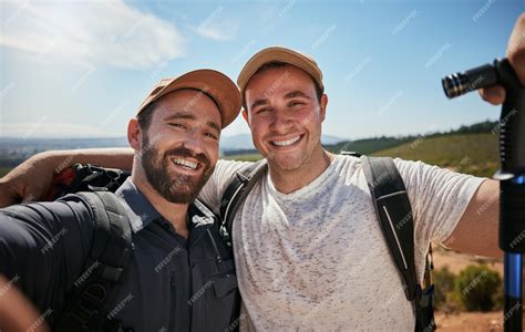 Premium Photo Friends Brothers Or Hikers Taking A Selfie While Hiking