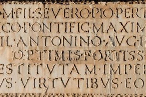 Close Up Of Ancient Roman Latin Inscription In Stone Background