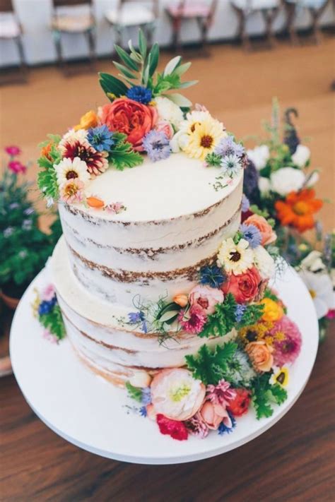 Semi Naked Wedding Cake With Bright Flowers Wedding Decor Naked