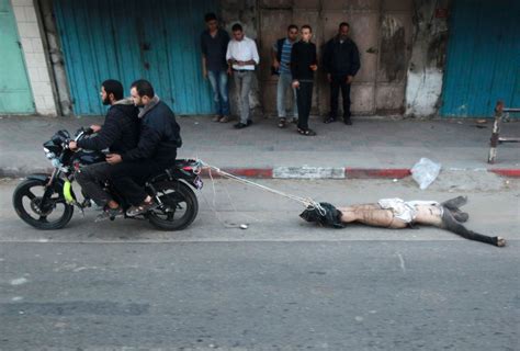 Video Men Drag Body Of ‘israeli Spy Through Gaza Streets The Washington Post